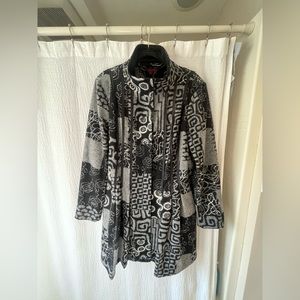 Simon Chang jacket/coat. Lightweight and warm